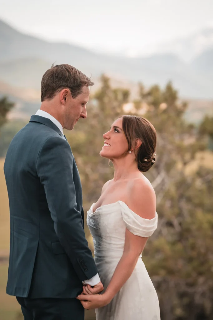 Bride and groom smiling during Carbondale Private Ranch Wedding