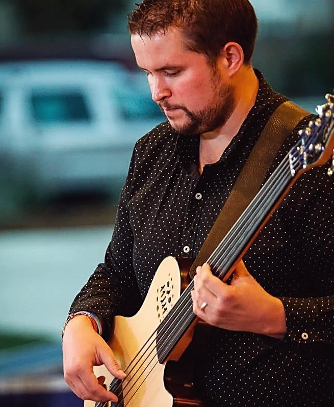 Pluckd bass faculty member featured for brass, winds, and percussion programming