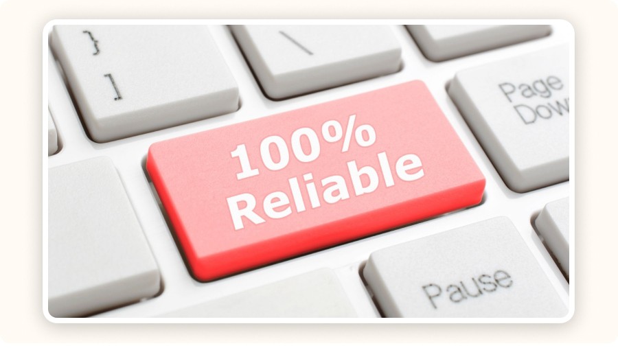 Red keyboard key labeled “100% Reliable”