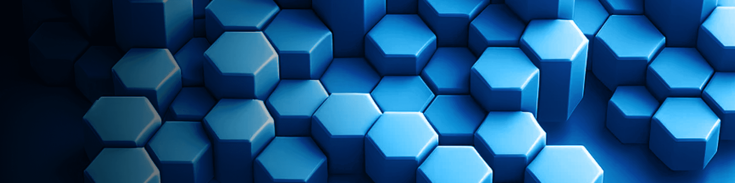 This image displays a pattern of three-dimensional hexagons in varying shades of blue. The hexagonal shapes are arranged in a tessellated manner, forming a continuous surface with some hexagons appearing slightly elevated, creating a sense of depth and contrast through lighting and shading. The overall effect is a visually striking geometric design with a cool, futuristic feel due to the blue color palette and structured composition.