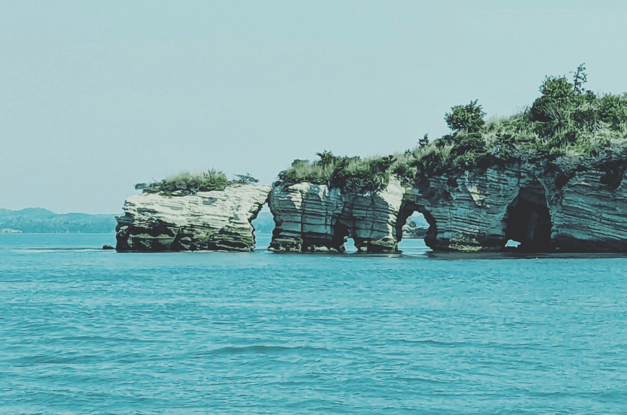 The ocean with land in the distance