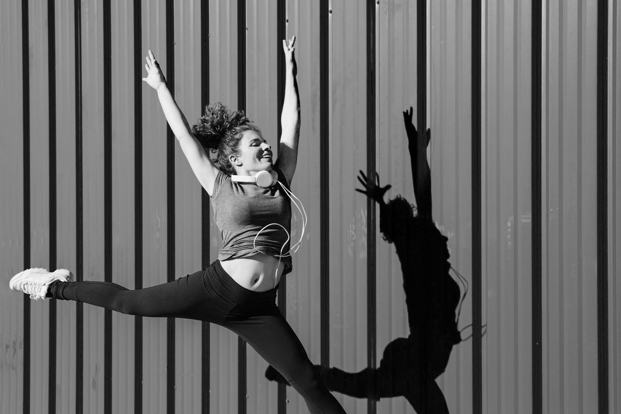 a woman is doing a piyoma exercise in a gym