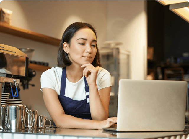 Photo of an attendant operating a computer