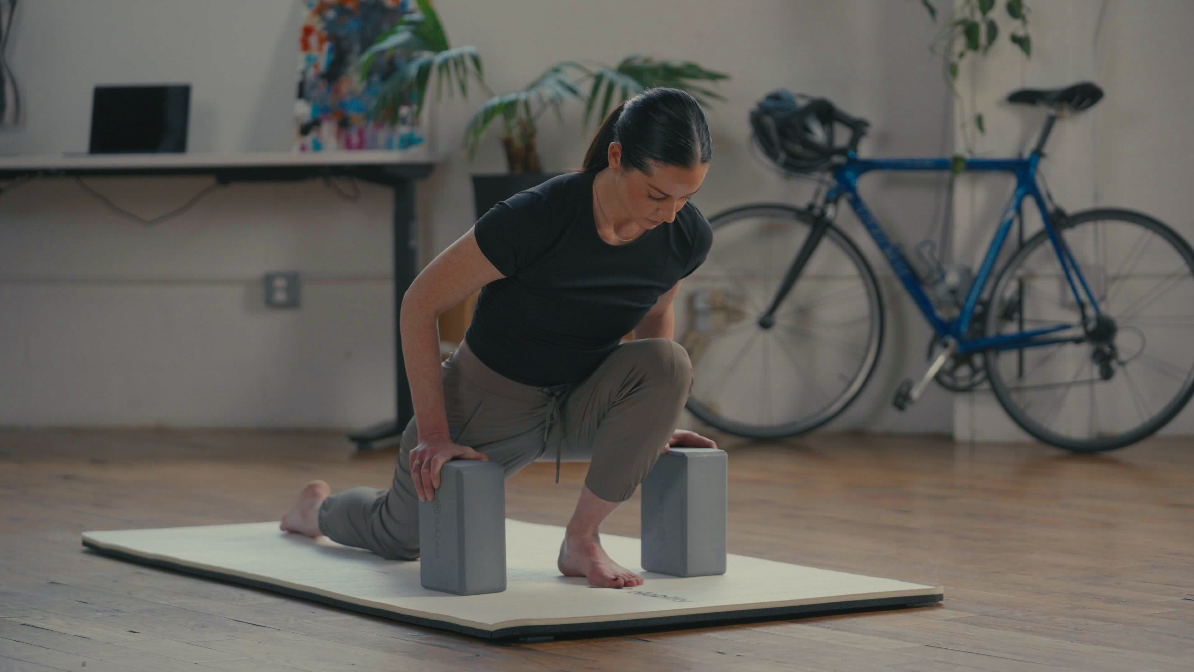 Woman Working out in Room - Back Mobility Exercises