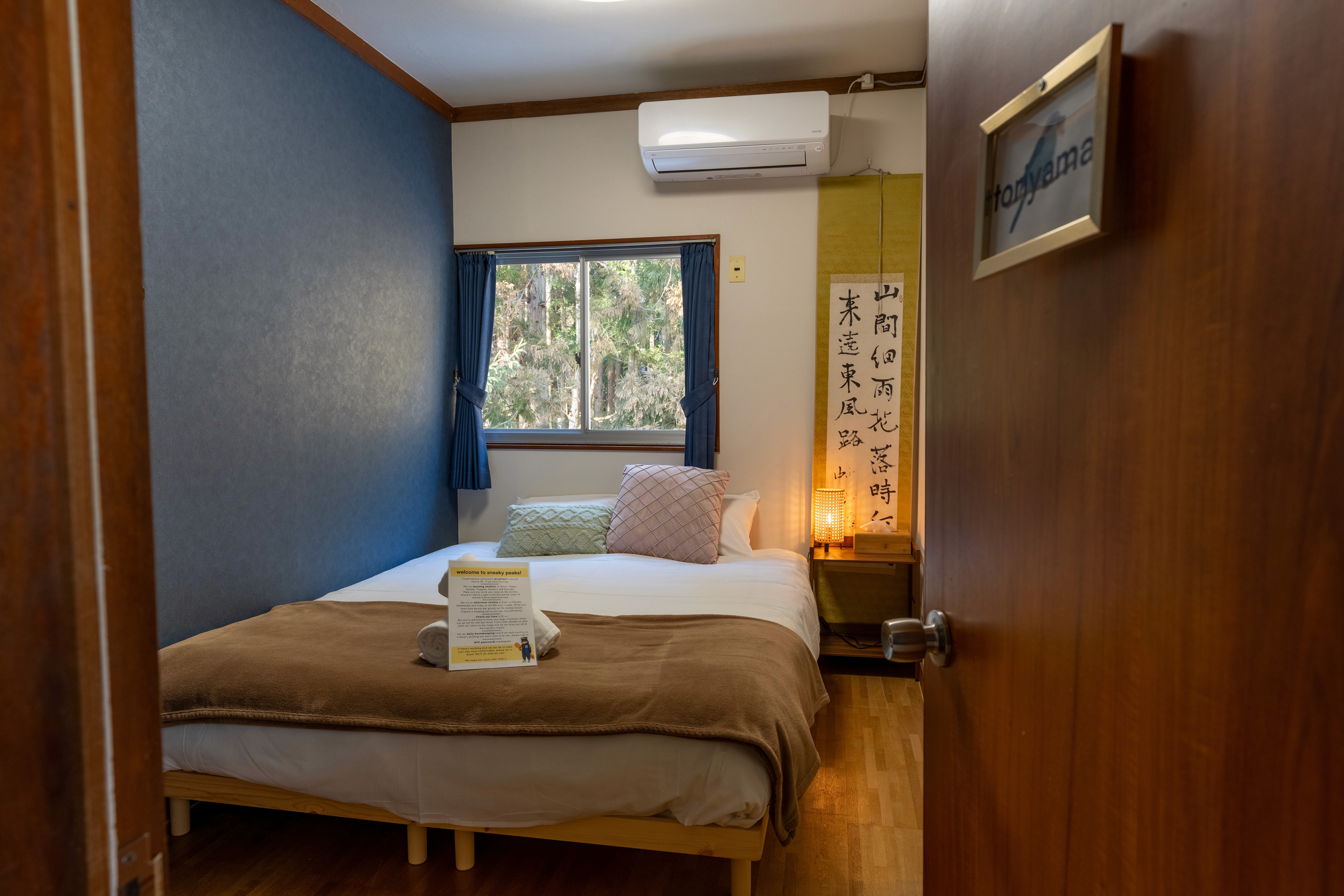 Economy Queen room interior at Sneaky Peaks, Hakuba