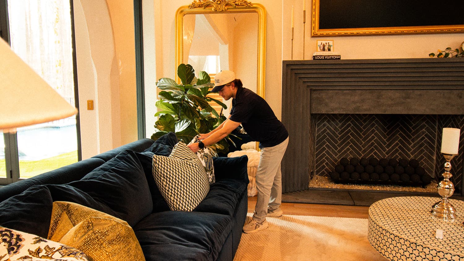 Mover placing a couch