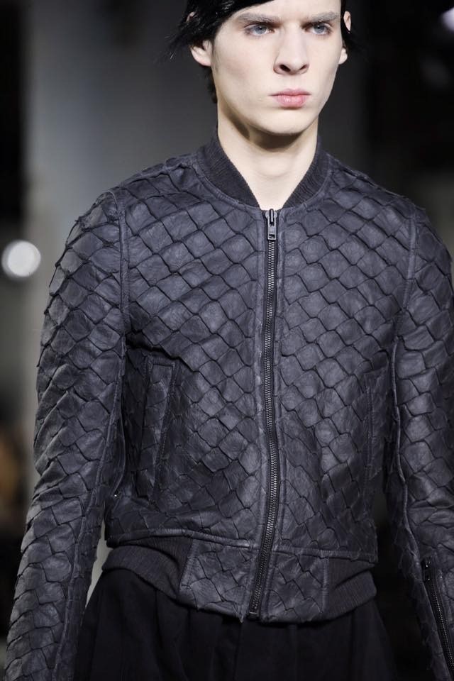 husband and wife working happily on a laptop