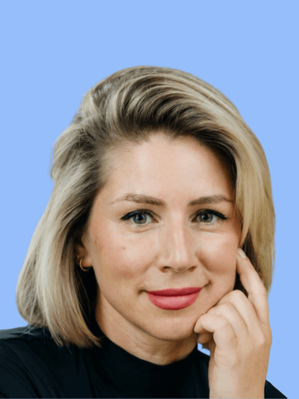 Close-up of a tree stump showing growth rings and a textured brown wood surface.