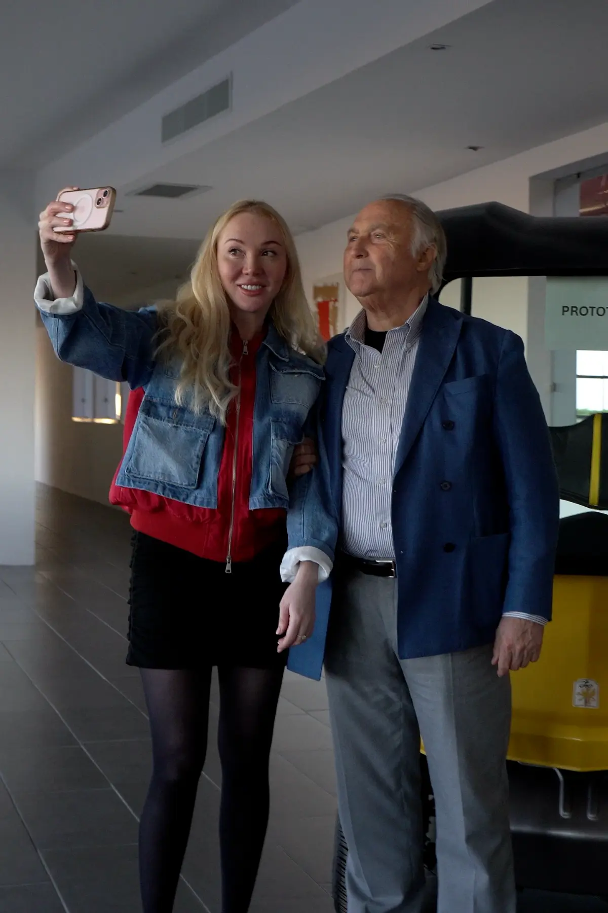 Tonino Lamborghini and Elena taking a selfie together inside the Museo Tonino Lamborghini in Bologna