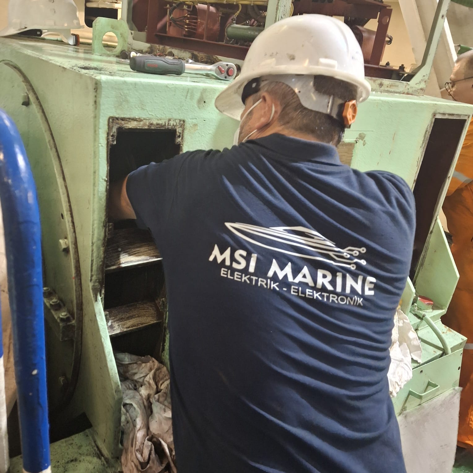 husband and wife working happily on a laptop