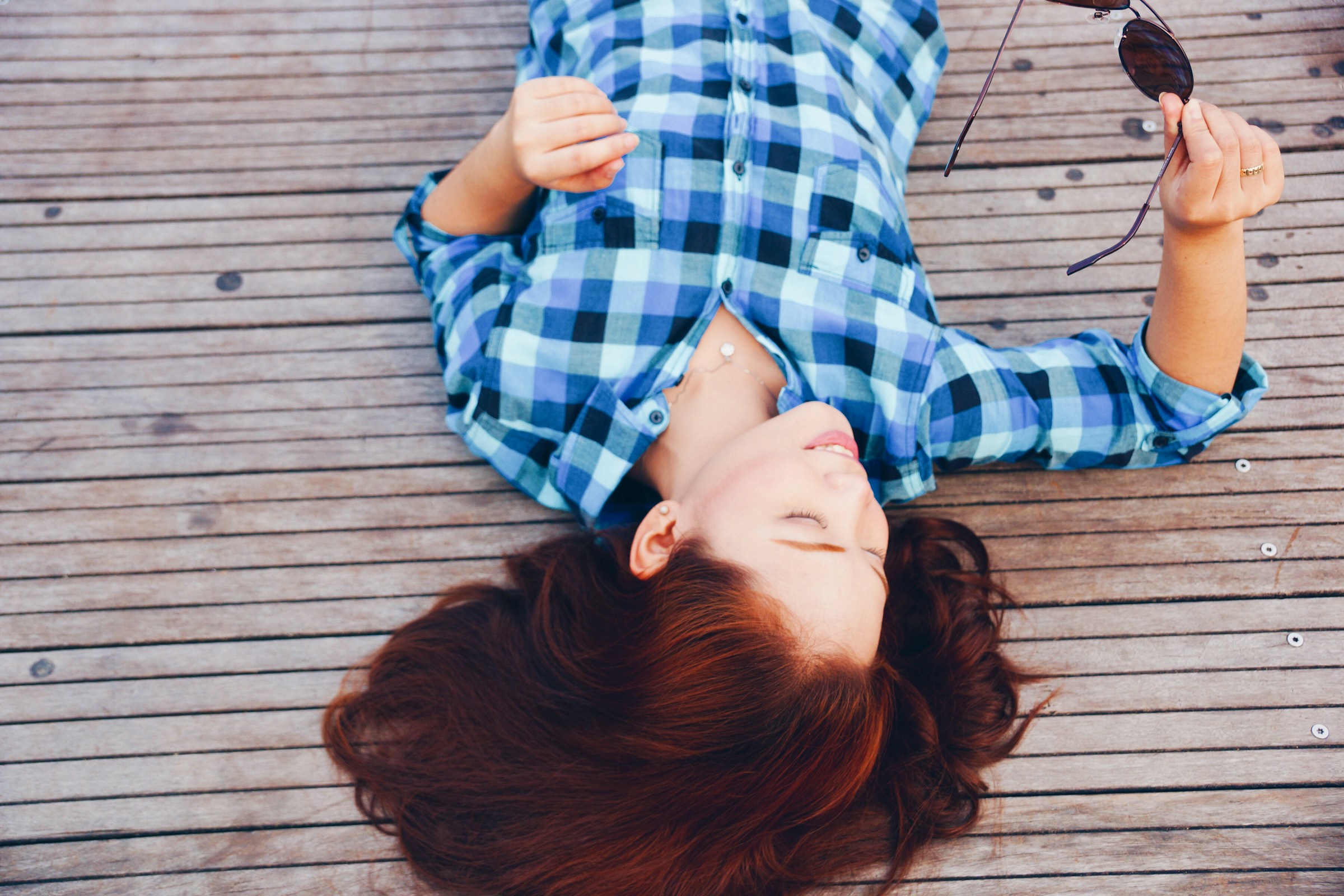 woman enjoying life - What Color Goes with Navy Blue