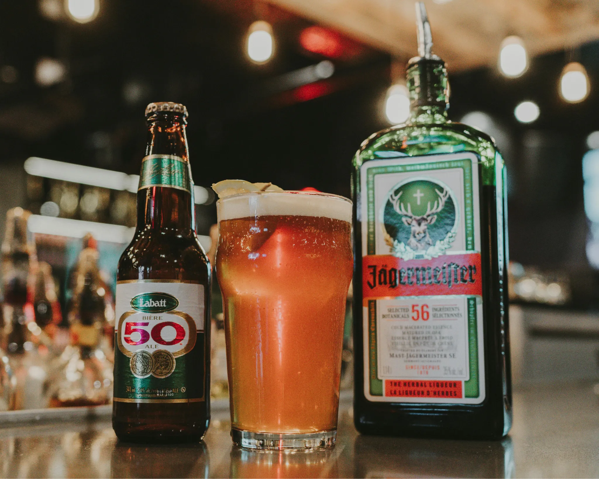 A person stands in a sandstone cave.