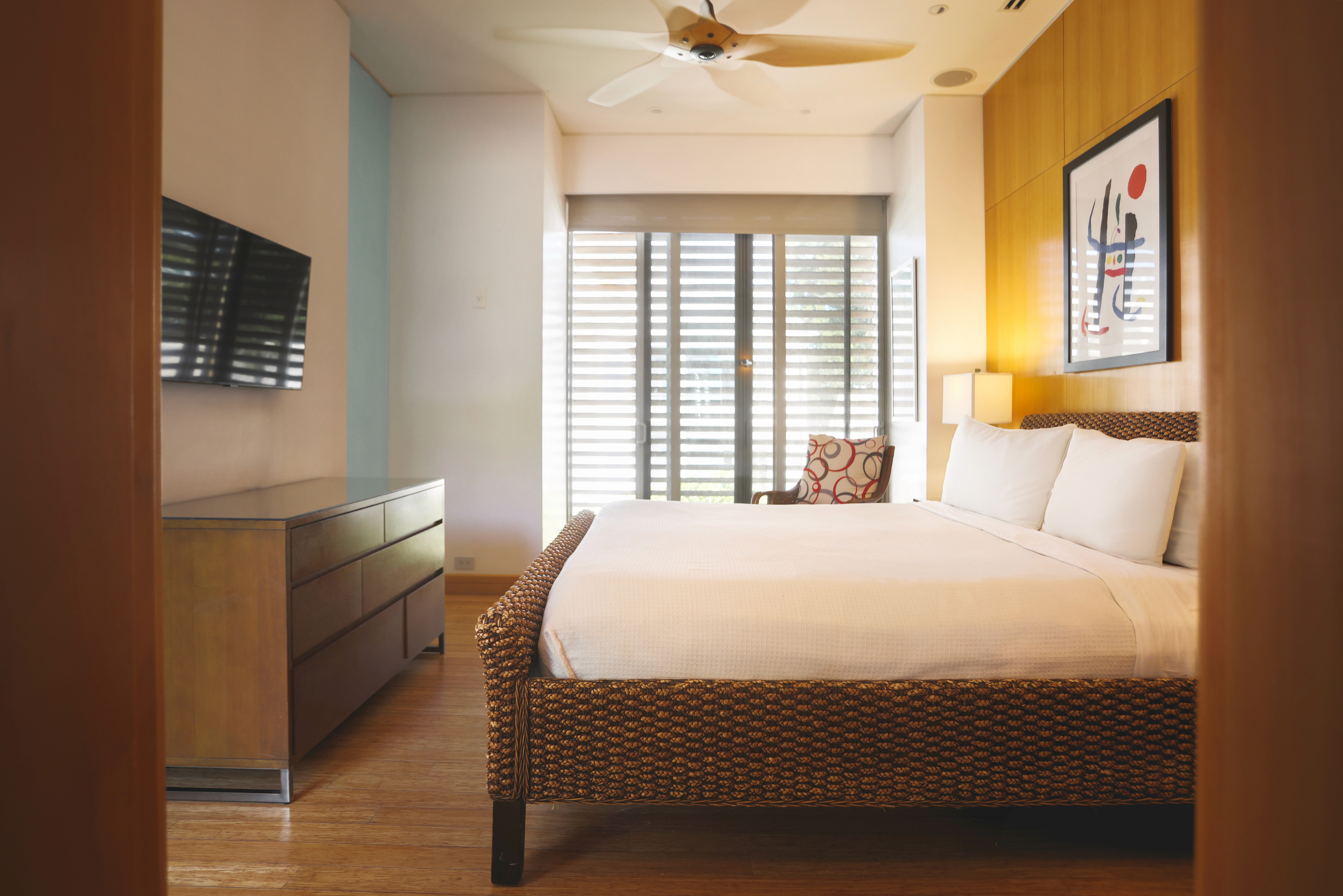 bedroom with minimalist decor, blending style and comfort in contemporary Key West lodging