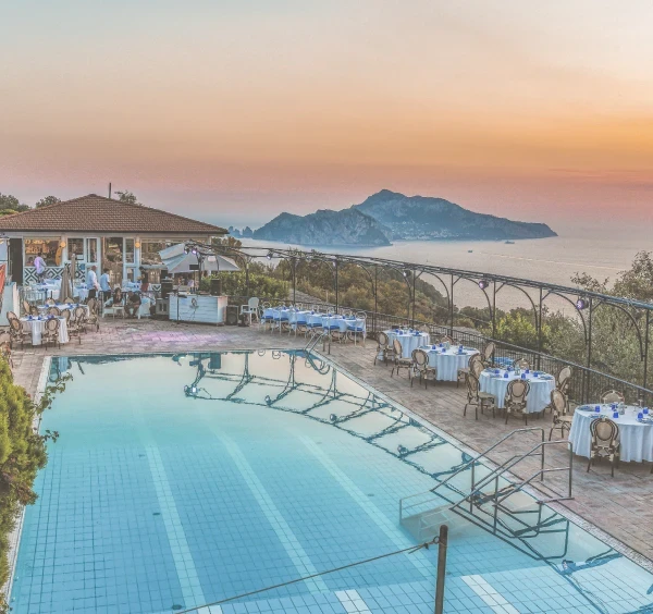 "Infinity pool at sunset overlooking Capri