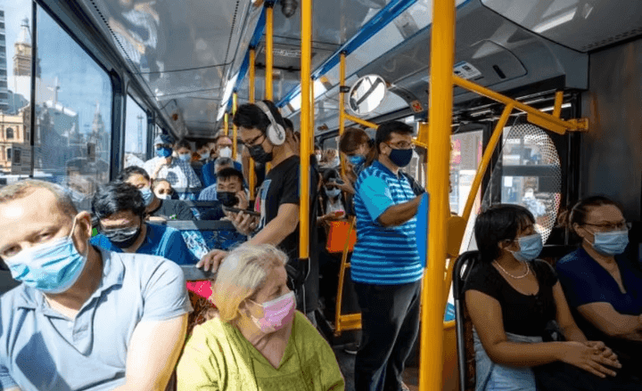 Crowded buses - Everyone wearing masks
