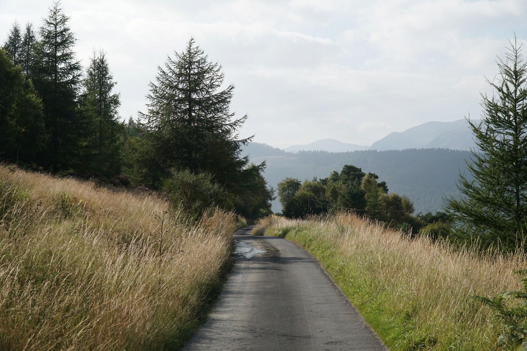 On the road towards Loch Tay, a summer view of the rolling hills in Scotland