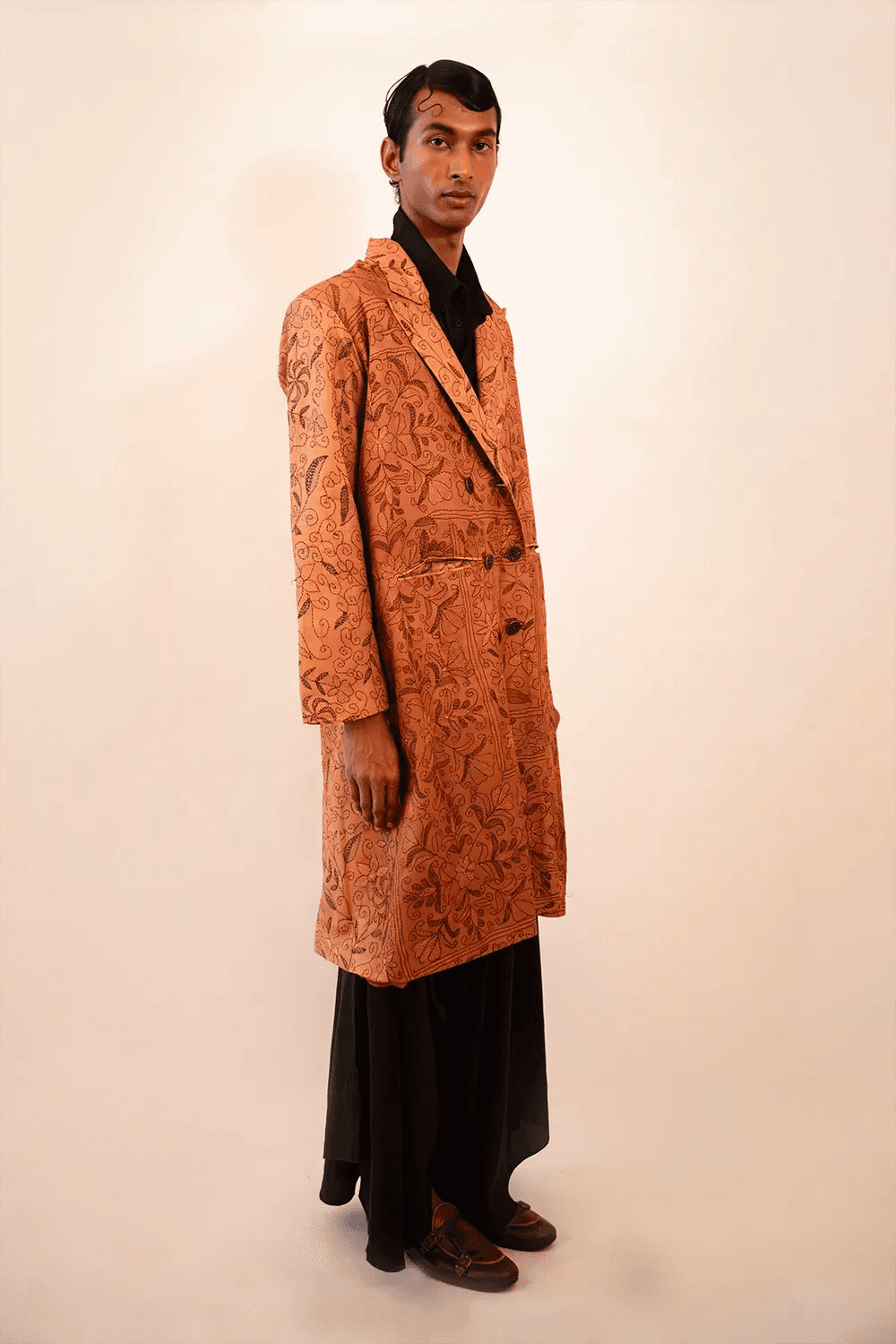 Ved is our one-of-a-kind double-breasted silk trench coat, handcrafted by skilled artisans in-house using a vintage silk sari. 