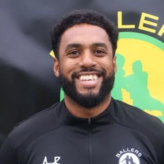 a man with a beard wearing a t - shirt that says mullehauss