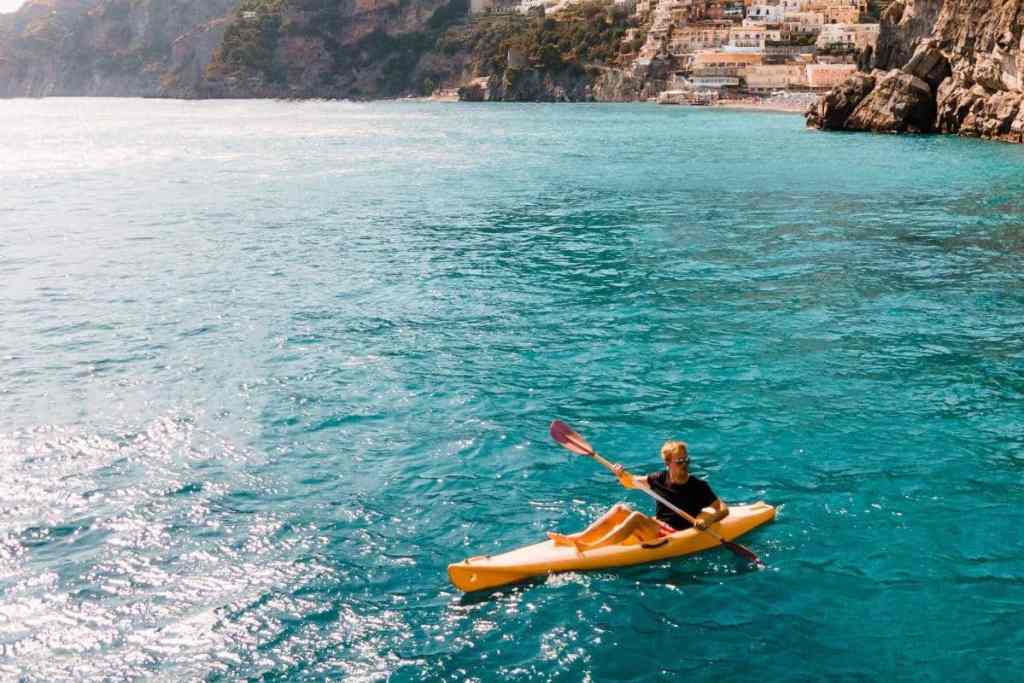 Kayaker on the blue waters near Cinque Terre
