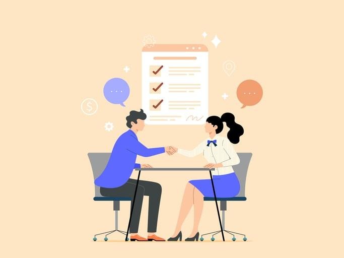 A hiring team is gathered around a table, engaged in a structured interview debrief session, discussing candidates' abilities and sharing constructive feedback on the interview process. The team members are actively listening to each other, ensuring a thorough evaluation of the candidates' responses and skills to identify the best fit for the vacant position.