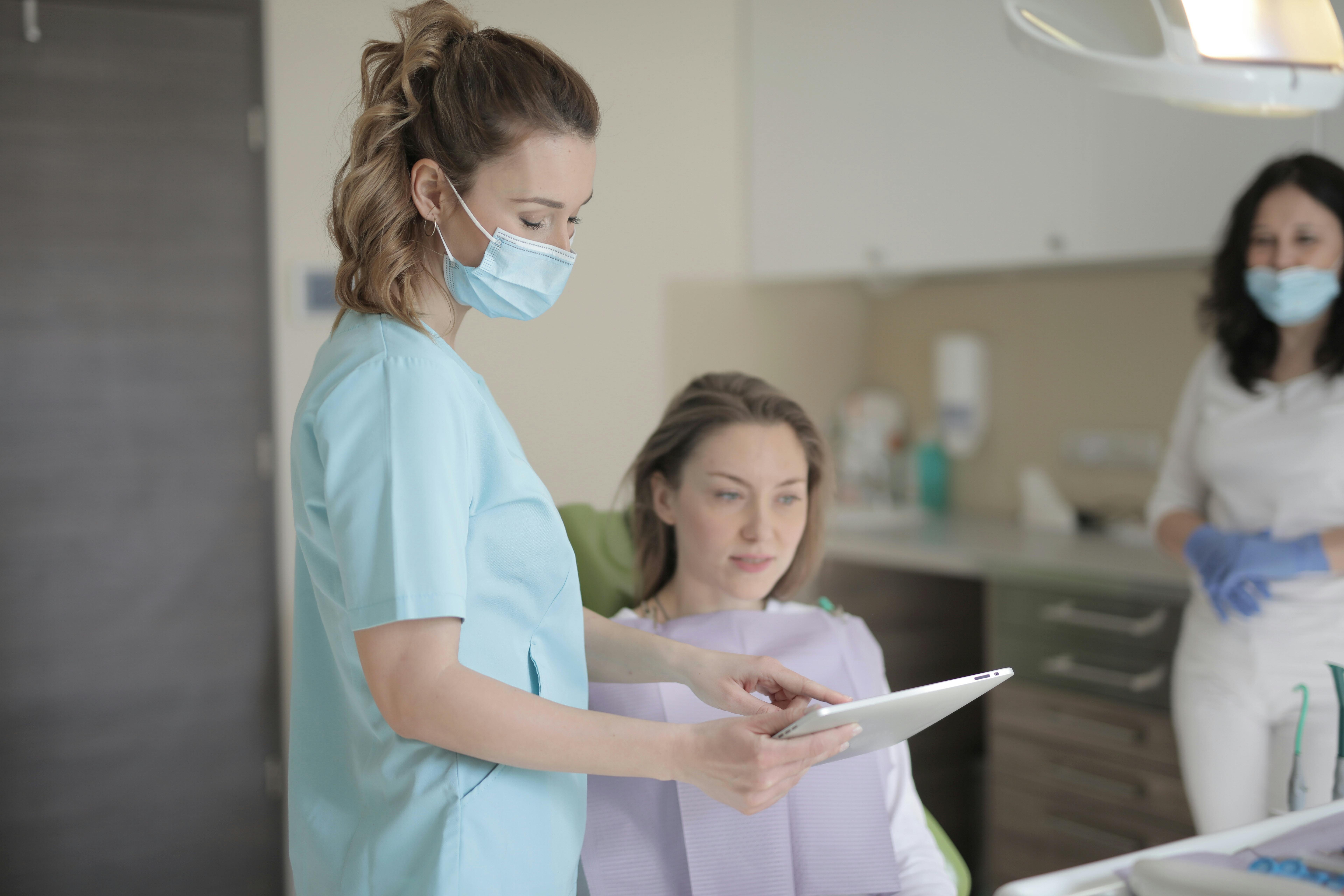 dentist communicating with patient