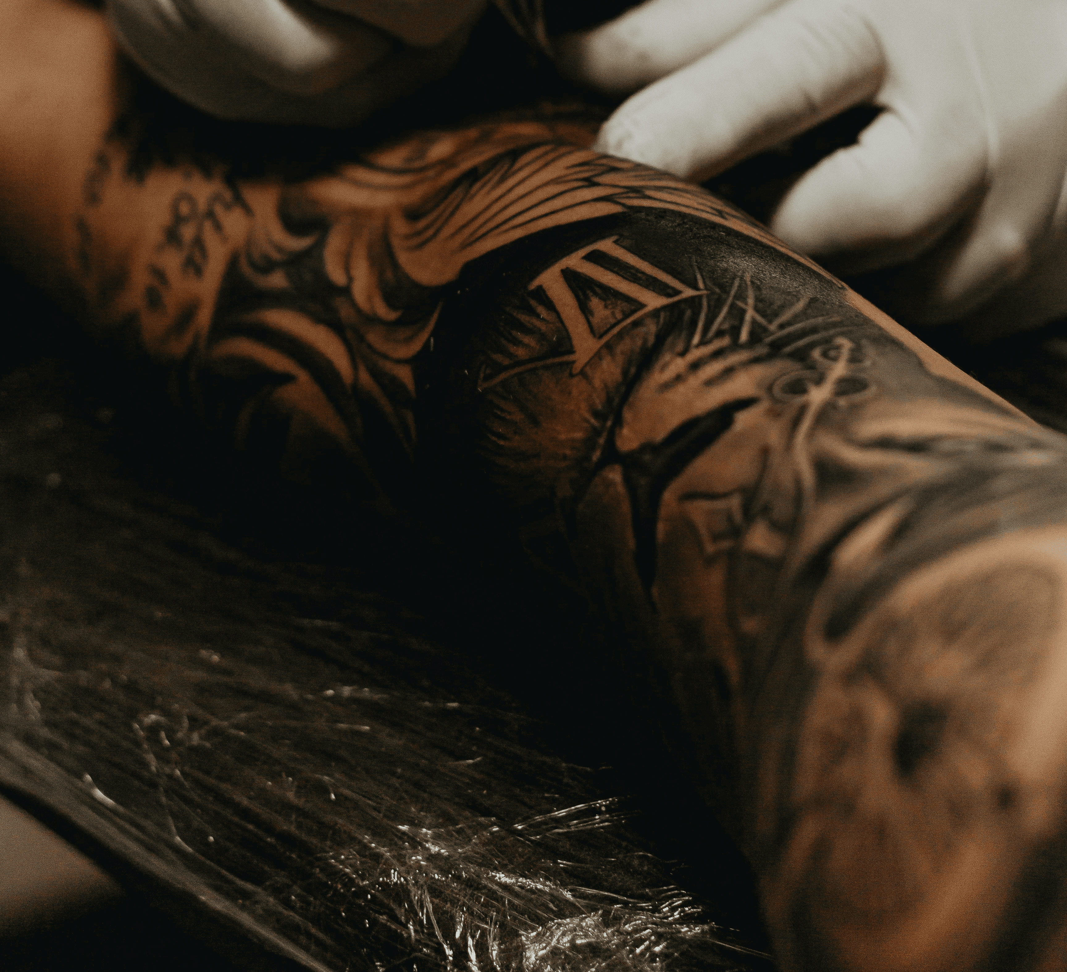 person doing tattoo