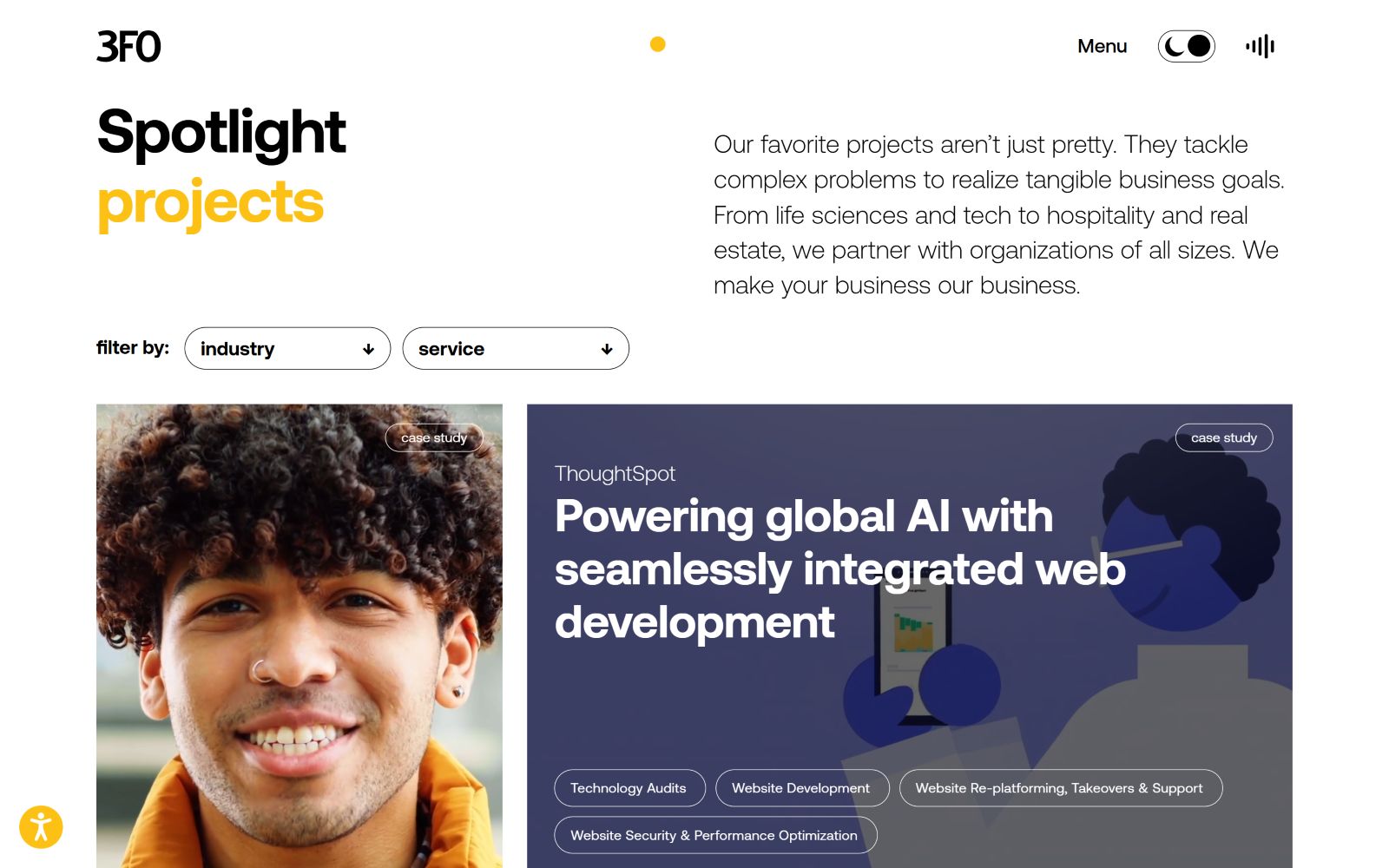Man smiling on left; text "Spotlight projects" in yellow and black on right. Below, web design case study titled "Powering global AI.