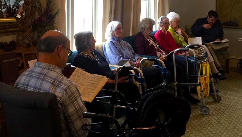 Resident enjoying devotionals at Rock Creek Manor, Jasper GA