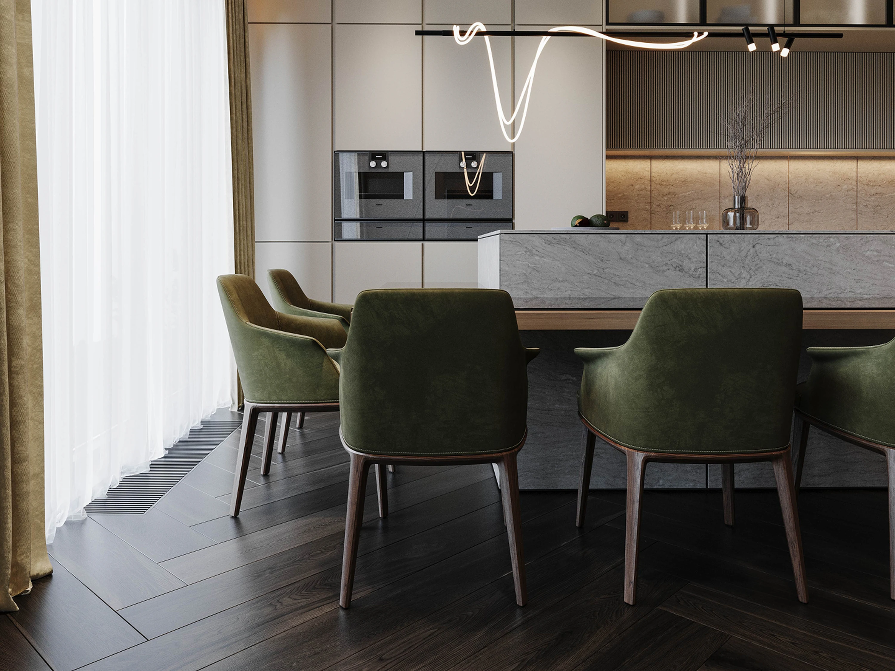 Cuisine — façades lisses et plan de travail en chêne.