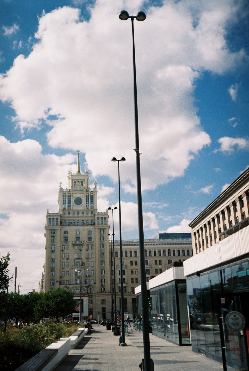 Outdoor Café Seating in a Sunlit Alley