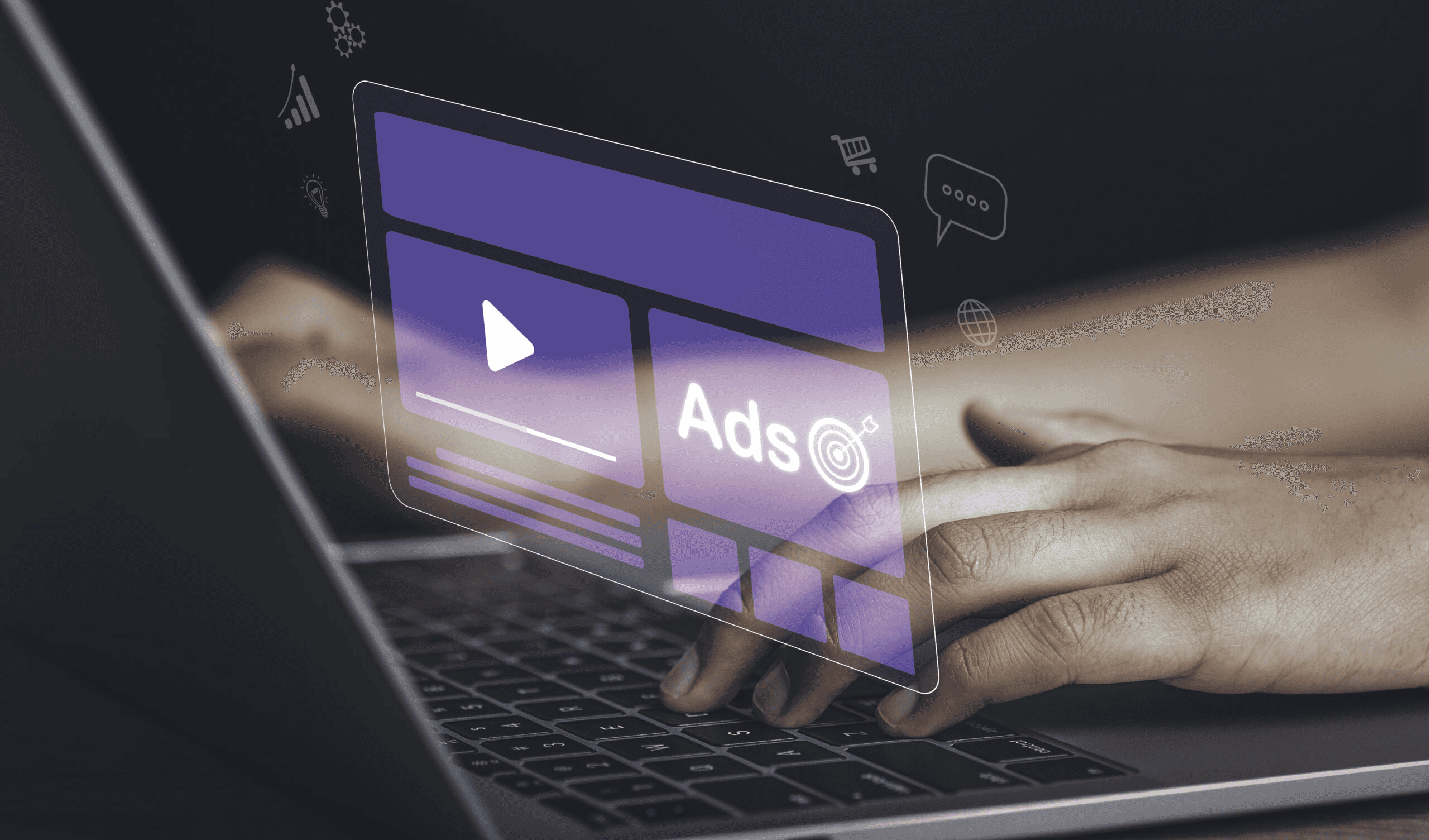 Person typing on laptop running digital advertising - How to Increase Video Engagement