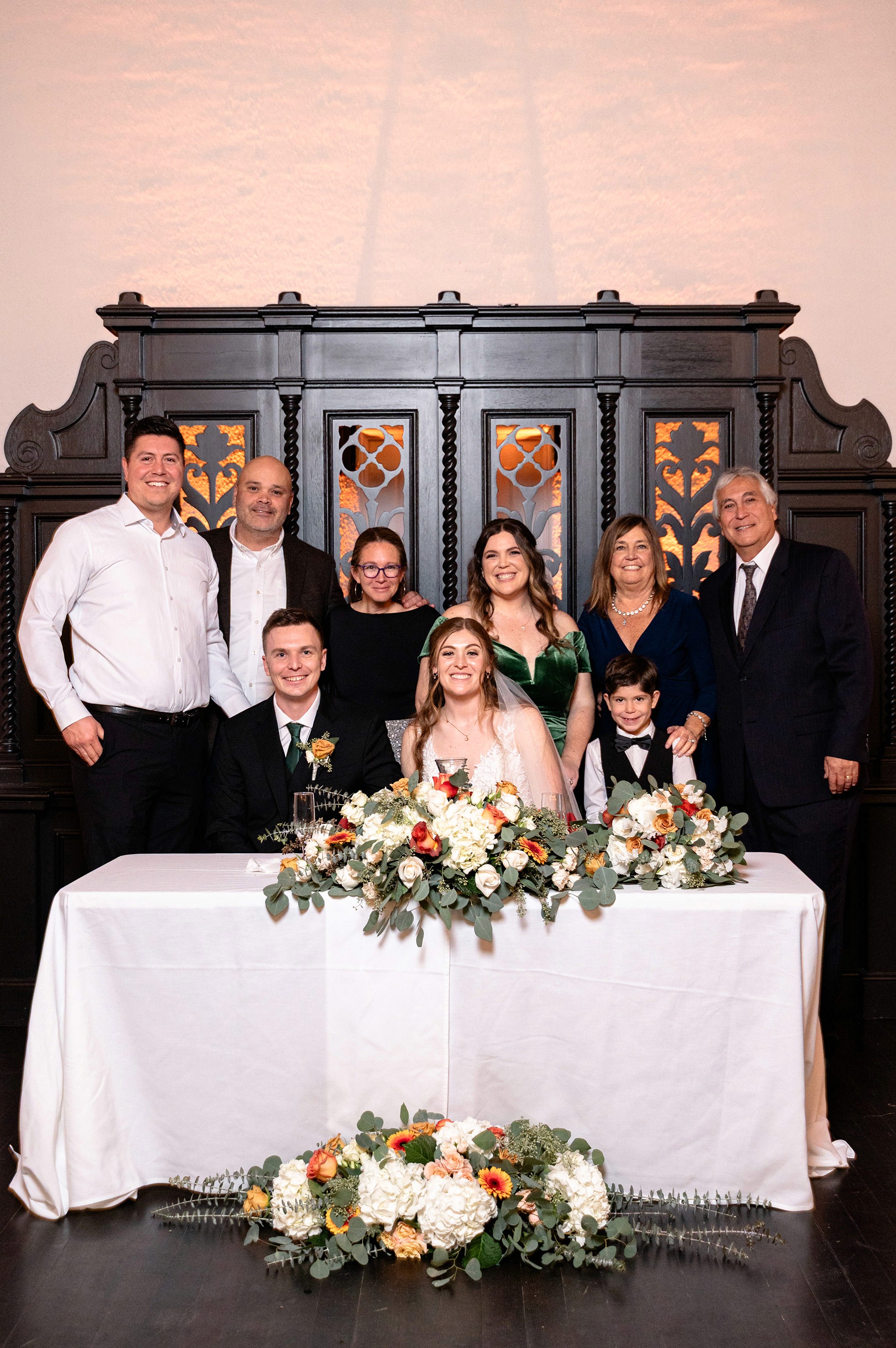 Flat lay wedding details with bouquet, rings, and sparkling bridal heels