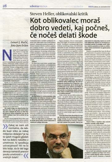 A newspaper with a photo of a man wearing glasses.