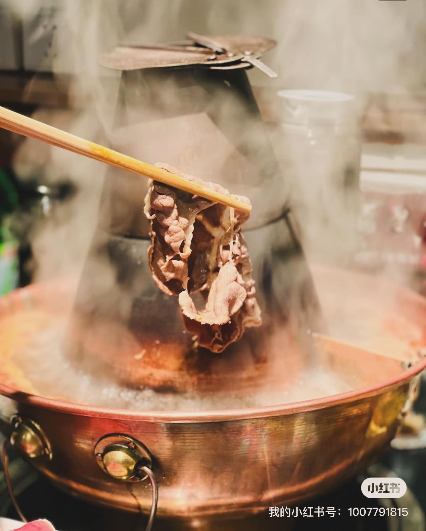 Grilled chicken cartilage at Le Sia, seasoned with cumin and chili powder for a bold, crunchy snack.