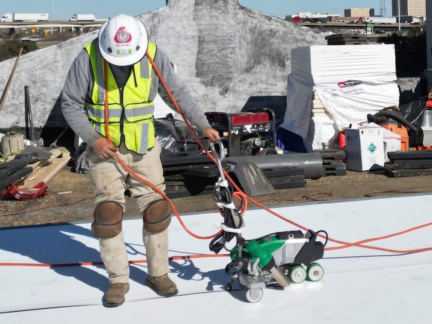 Tapered Poly-ISO insulation system installed with low rise foam for proper drainage