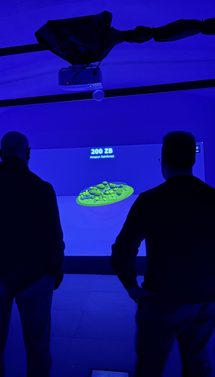 Visitors face The Byte Room’s projected data environment.