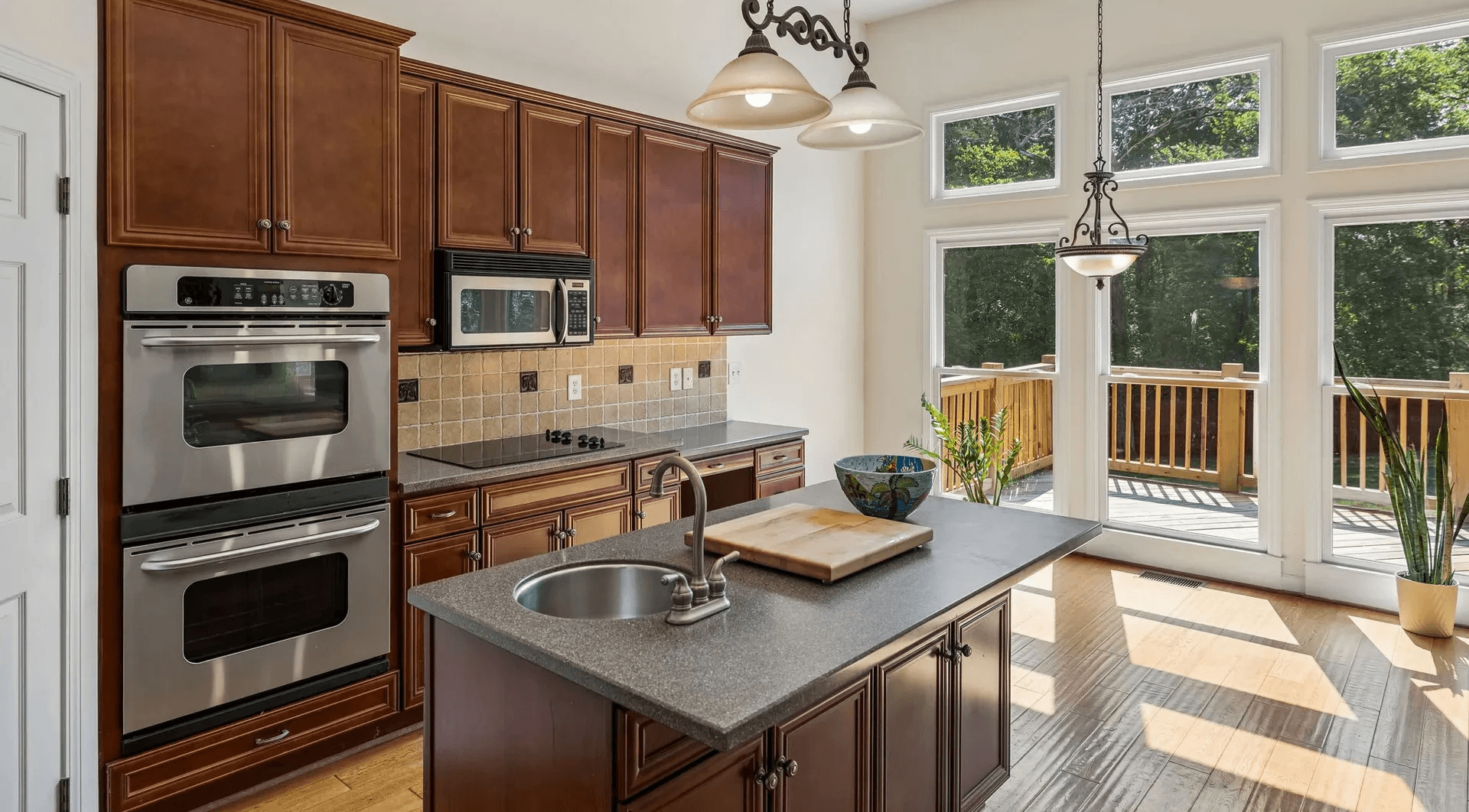 Kitchen with double oven and large windows