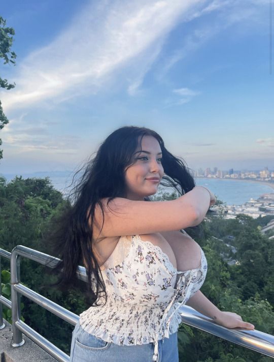 kids lying on a glass land and smiling