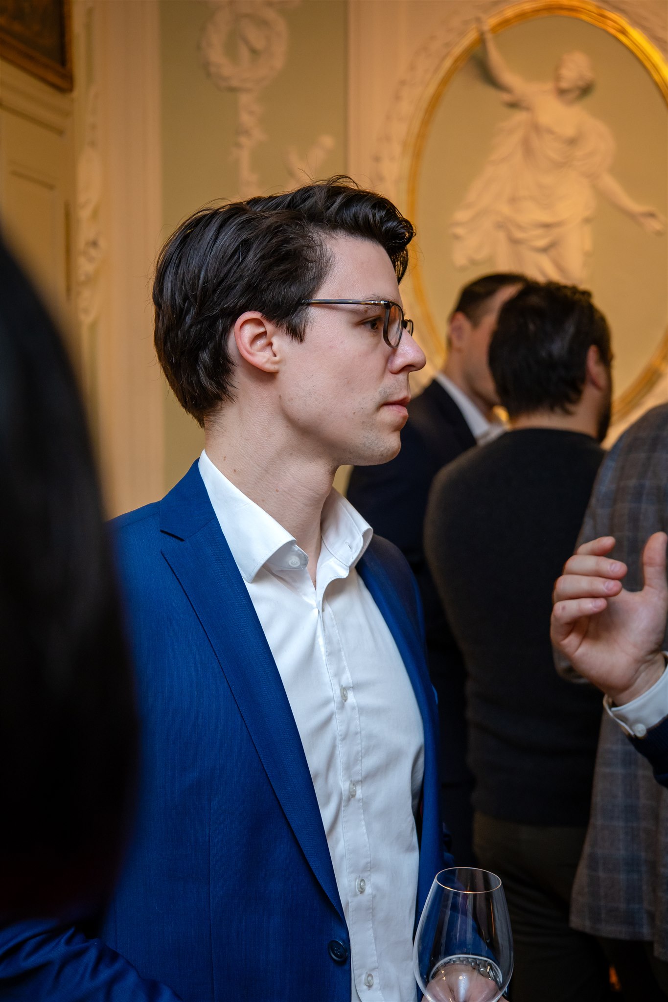 Guest listening during Recht KI book launch event in Zurich