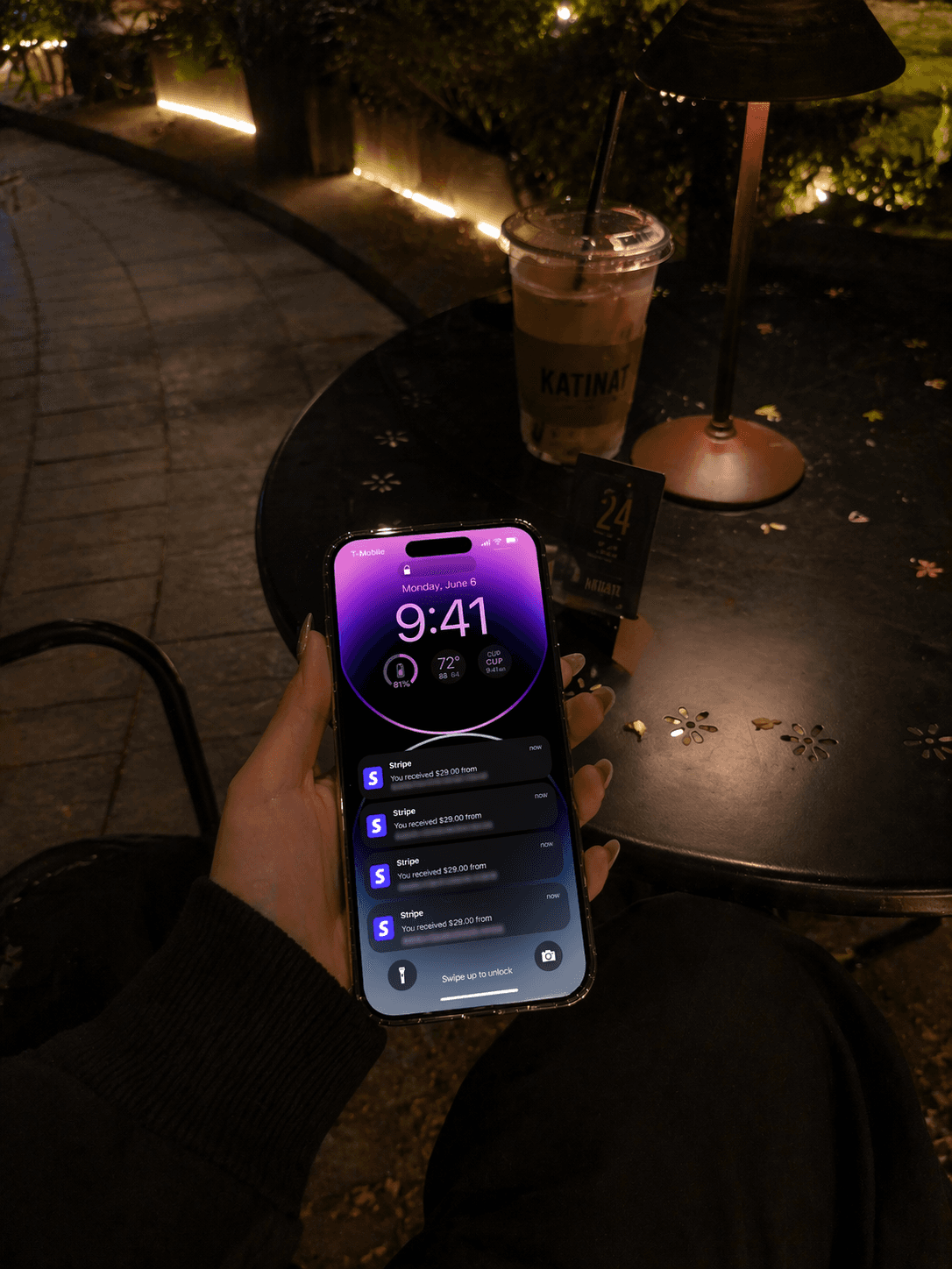 Screenshot of an iphone lockscreen with multiple Stripe sales notifications