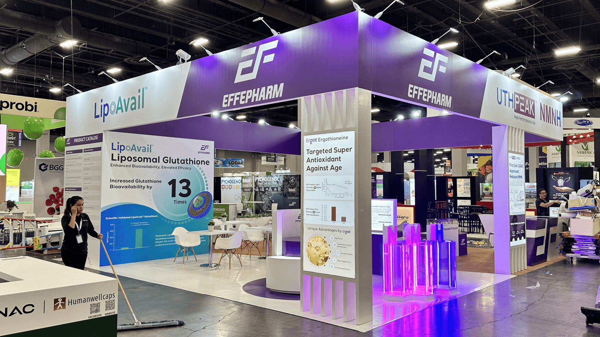 Mandalay Bay rental booth planning example with branded graphics, product display counters, sample tables, storage, and buyer meeting space