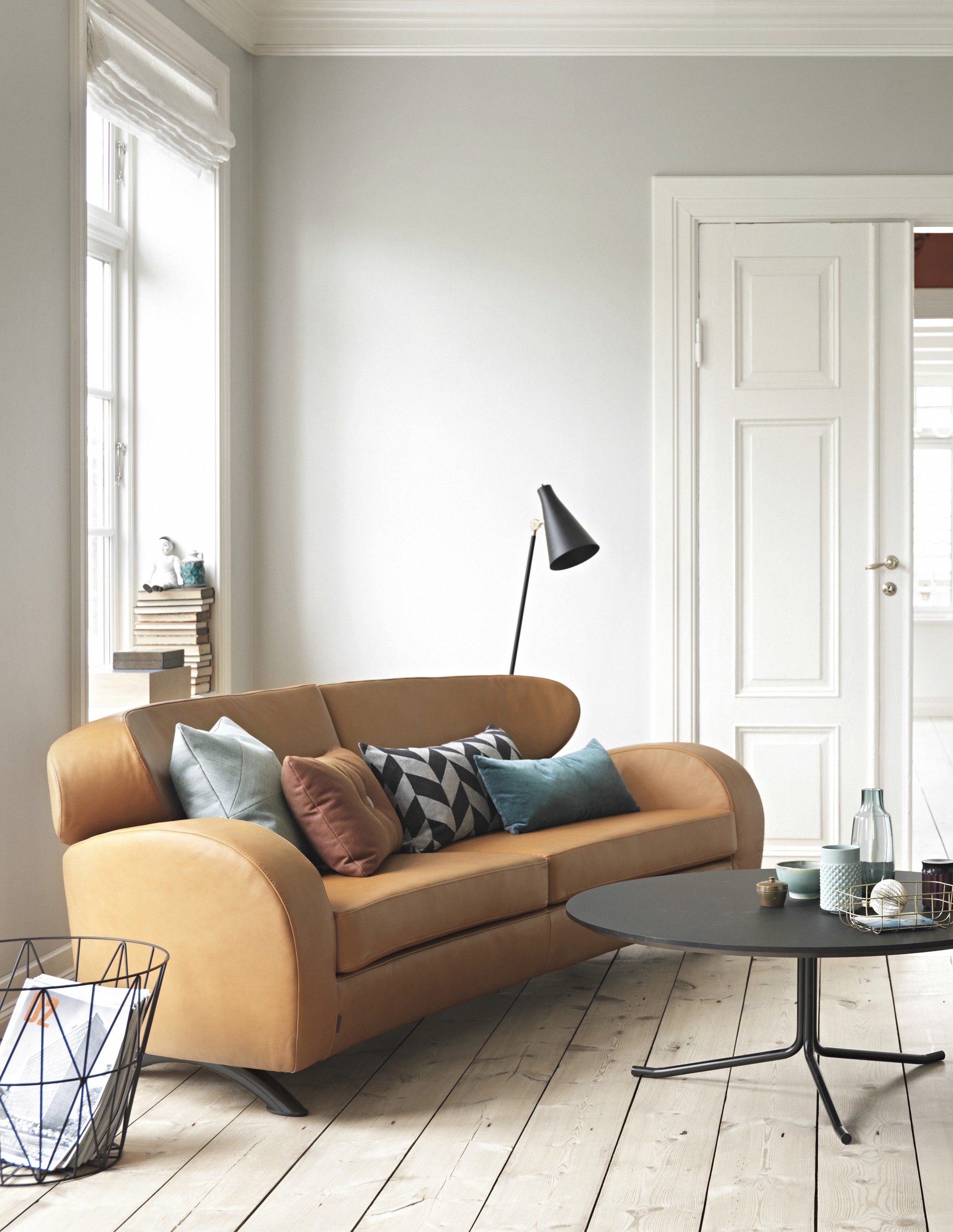 A round ceramic vase with afternoon light casted onto it