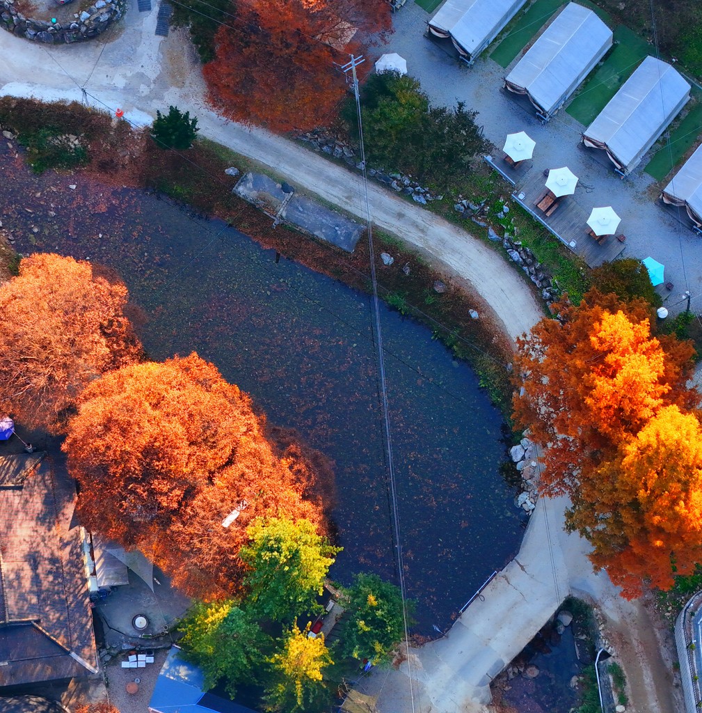 Drone shot of a running track at night
