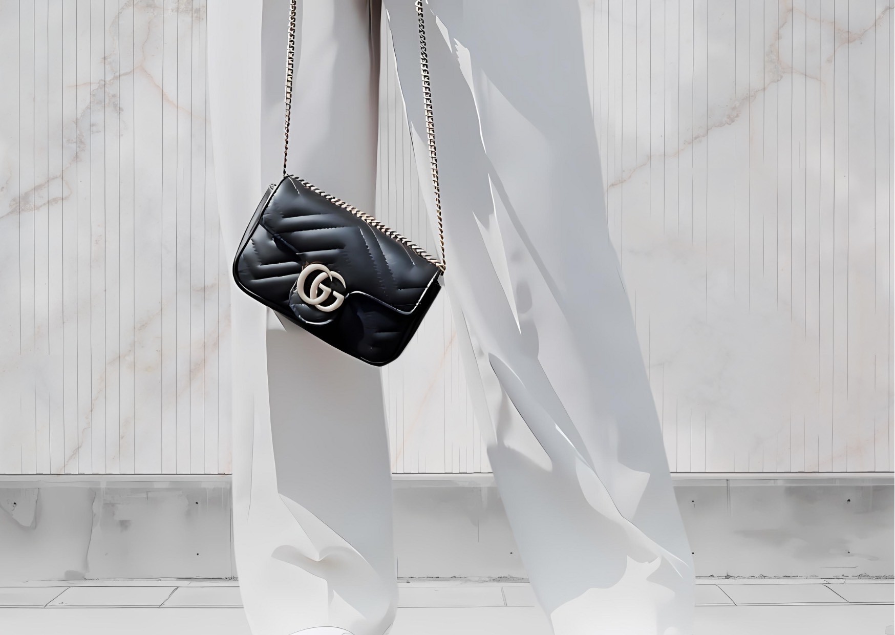 fashionable, elegant woman in white pants carrying a black, chic, Gucci, GG marmont matellasse shoulder bag, on the street outdoors.