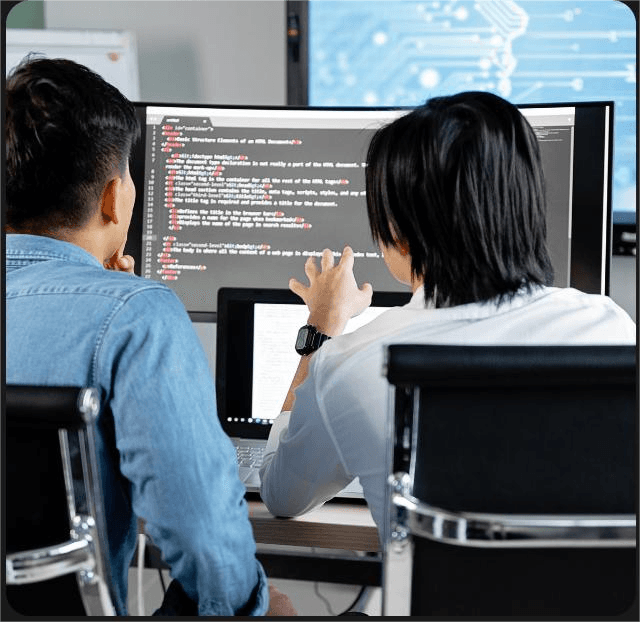 A focused NDIS Support Coordinator working at a desk, researching provider options and managing complex participant plans on a computer.