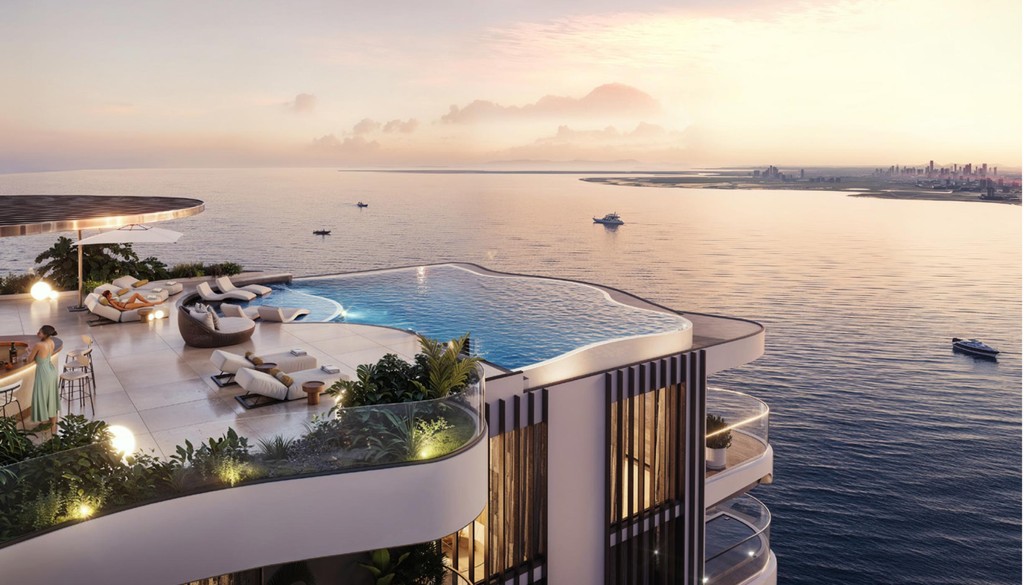 A modern hotel at Miami beach, part of 'The Collection,' offering luxurious accommodations and oceanfront scenery.