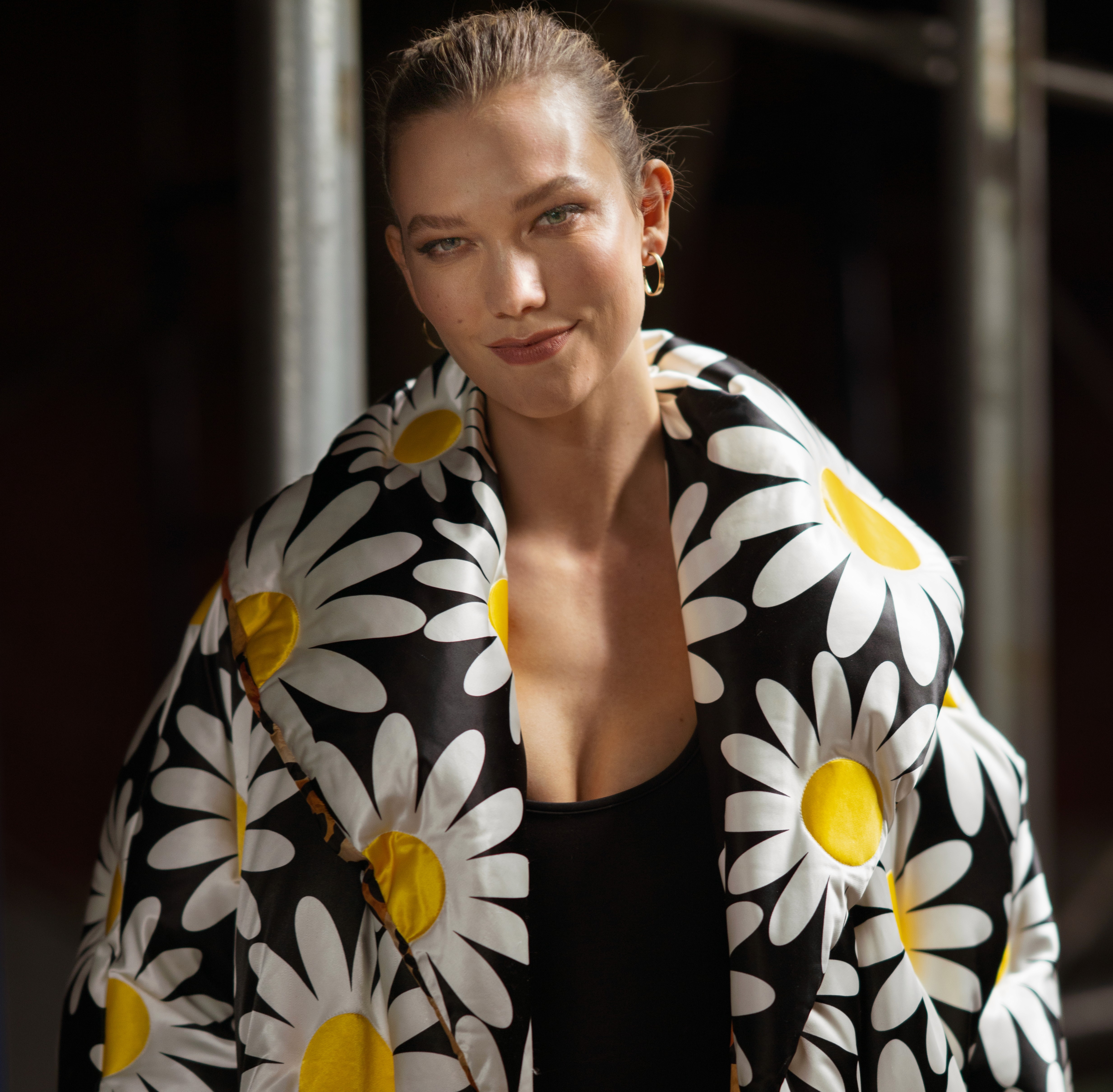 Persons heads on a white surface