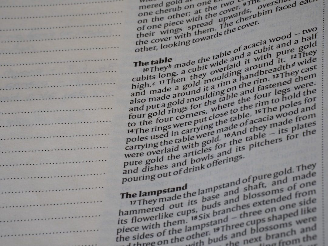 Close-up of text on a page with a dotted margin.