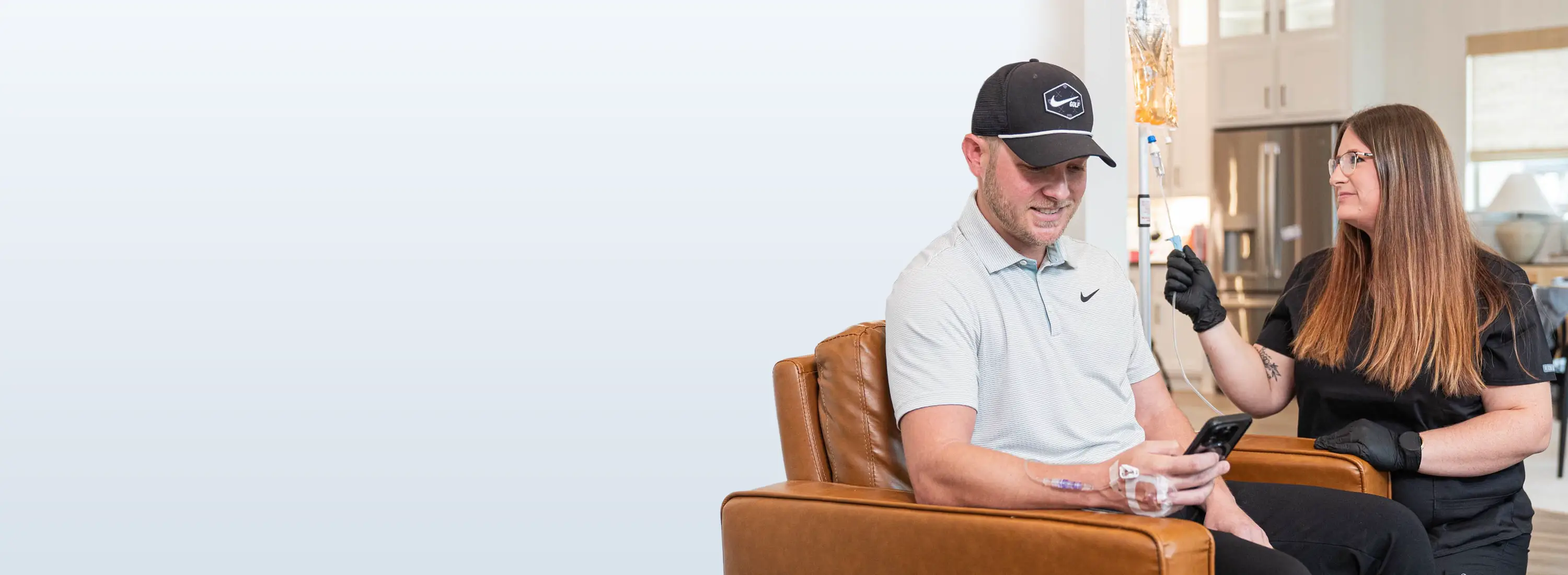 Golfer with heat exhaustion receiving IV hydration in home