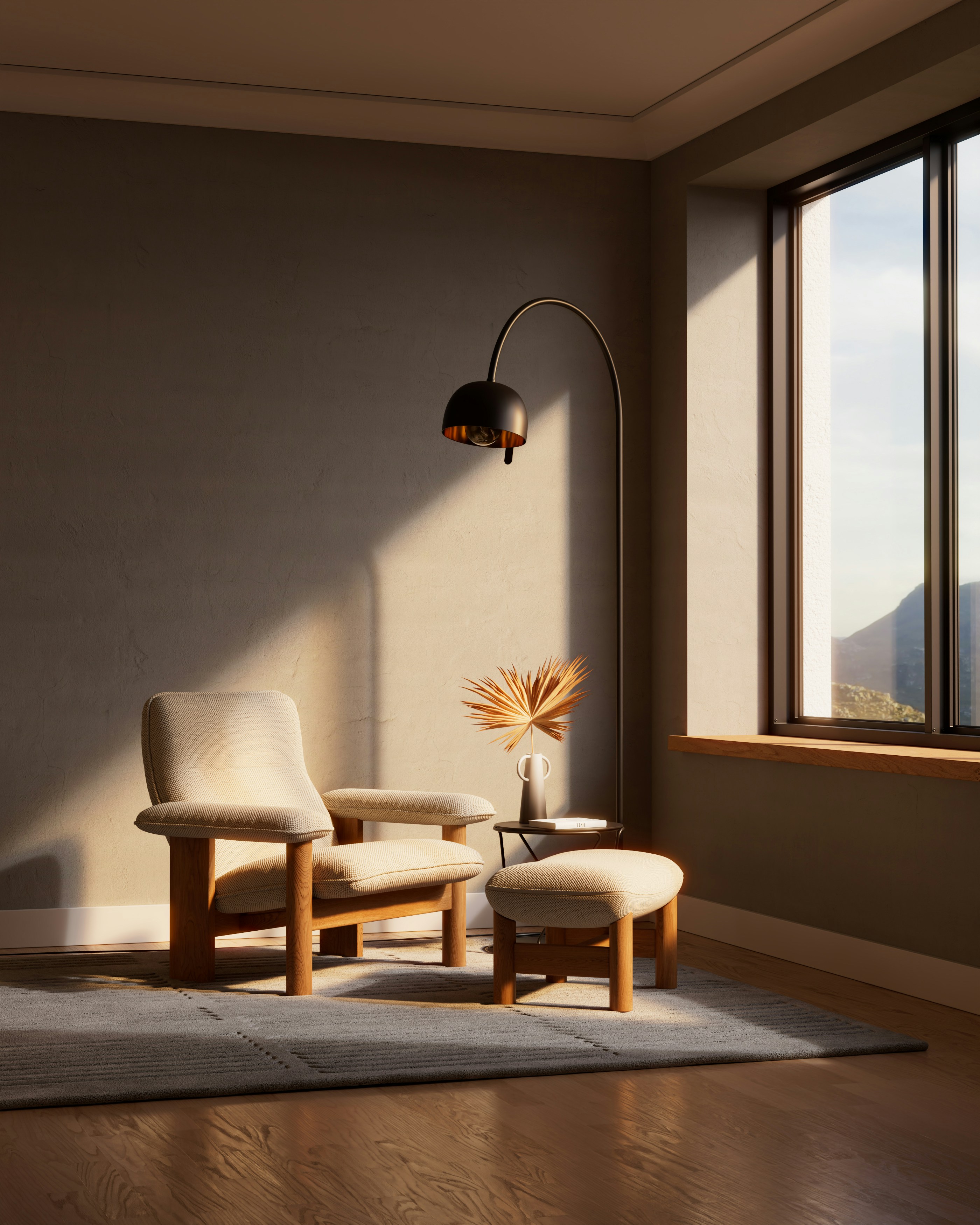 Modern armchair and ottoman with floor lamp by window.